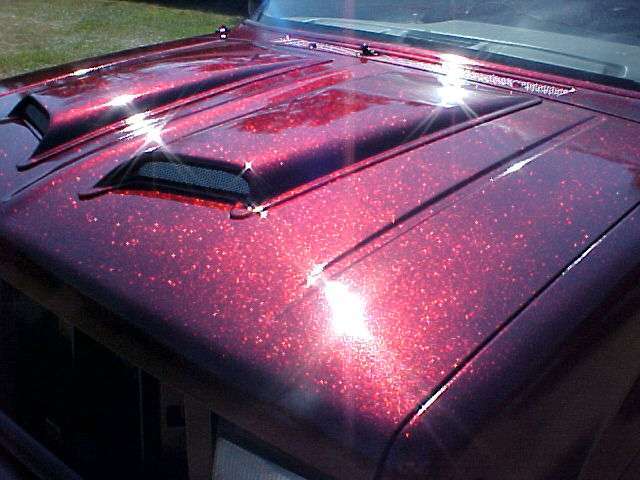 Rose Red flake Painted on an Explorer with just 1 Jar for this large SUV.