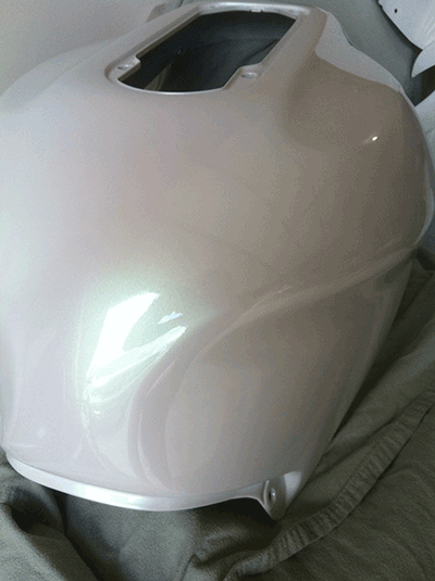 Green Shimmer Spectre Pearl Kustom Painted Motorcycle tank.