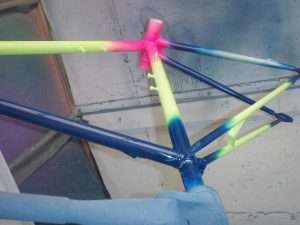 Several fluorescent pigments on a bike frame